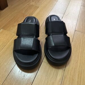 Platform black leather sandals